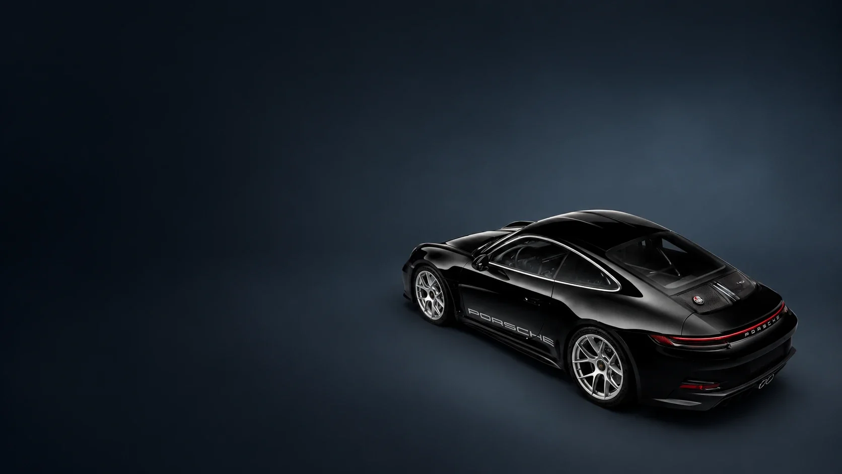 Черно Porsche 911 в студио